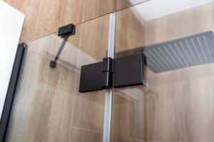 Read more about the article The Elegance and Functionality of a Frameless Hinged Shower Door
