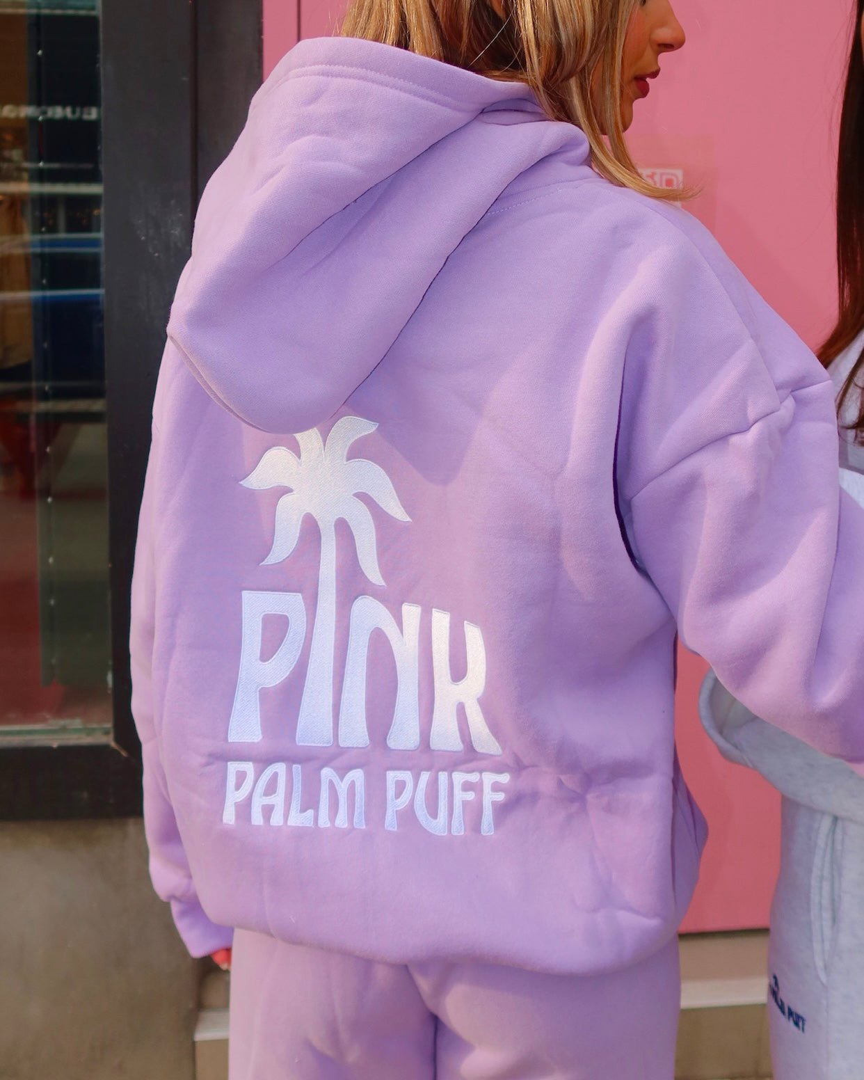 Read more about the article The Pink Palm Puff Hoodie: Where Comfort Meets Coastal Cool