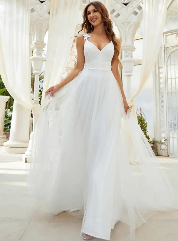 You are currently viewing The Ultimate Guide to Women’s Wedding Dresses: A Journey Through Style, Tradition, and Trends